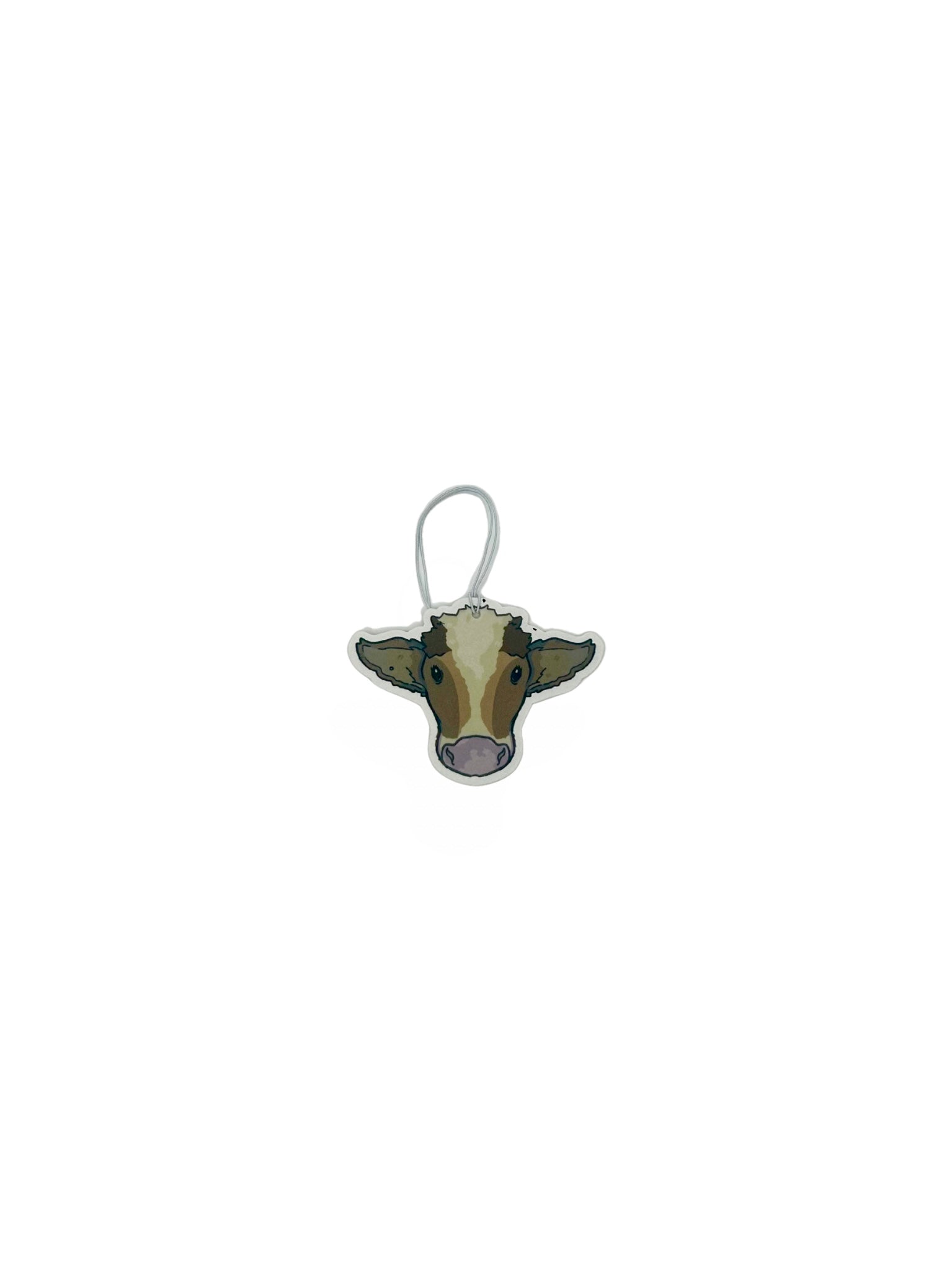 Brown cow vehicle air freshener, double sided print and scent of rainforest.