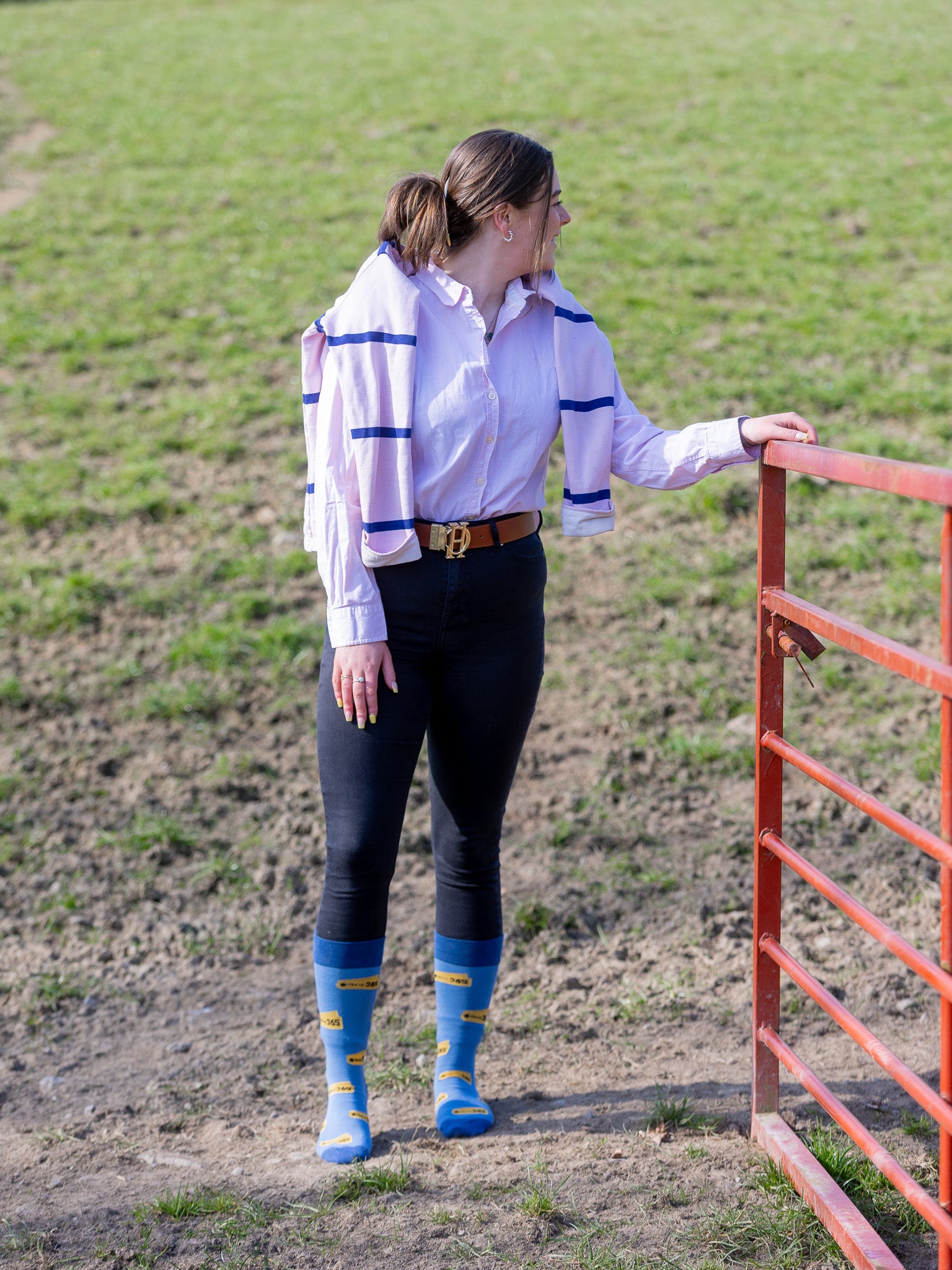 Women wearing sheep 365 crew socks on a light blue background with a darker blue top, heel and toe.