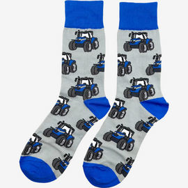 Blue country-style tractor socks featuring a modern tractor design on a grey background, accented with a matching blue top, heel, and toe. These cozy and stylish socks are perfect for farmers and tractor enthusiasts who love the countryside, offering both comfort and a touch of country charm for everyday wear.