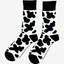 Black and white cow print socks showcasing a fun and trendy design inspired by classic cow patterns. Perfect for animal lovers, these stylish socks combine comfort and flair, making them ideal for everyday wear or adding a unique touch to your country outfit. Elevate your sock game with these chic cow print socks.