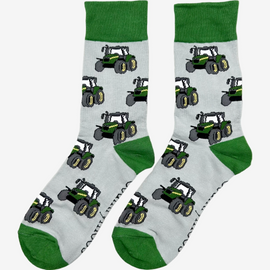 Green country-style tractor socks featuring a modern tractor design on a grey background, accented with a matching green top, heel, and toe. These cozy and stylish socks are perfect for farmers and tractor enthusiasts who love the countryside, offering both comfort and a touch of country charm for everyday wear.