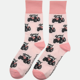 "These delightful pink tractor socks feature a lively tractor design set against a light pink background, complemented by matching pink heel and toe accents. Perfect for adding a pop of color to your country outfit, these socks combine comfort with a fun, rustic touch. Showcase your passion for farm life and cheerful style with these adorable and cozy socks!"