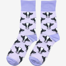 Purple cow socks featuring playful black and white cow designs. These stylish and cozy socks add a fun country touch to your outfit while embracing a whimsical farm theme. Perfect for animal lovers, country and outdoor enthusiasts, these socks are ideal for casual wear and adding a pop of colour to your sock collection and country style outfit.