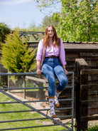 Cosy crew socks with a charming cow design. These socks have 2 brown cows and one black and white cow on a light cream background and vibrant bold brown top, heel and toe. 