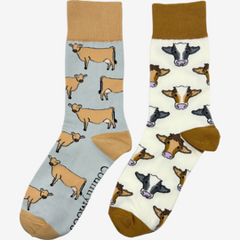 Jersey cow socks and mix cow socks featuring cute cow prints on light-colored backgrounds. These fun and stylish farm socks are perfect for animal lovers and add a whimsical touch to any country inspired outfit while providing comfort for daily wear. Ideal for gifting or enhancing your wardrobe with cow-themed attire.