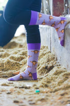 Step out in style with our purple and white striped cow socks featuring adorable black and white cows. Perfect for outdoor adventures or cozy days at home, these comfy socks add a playful touch to any outfit, making them ideal for cow lovers and those looking to elevate their wardrobe.