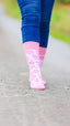 "Step into style with our charming pink cow print socks, perfect for adding a fun, farm-themed twist to your outfits! Inspired by the whimsical spirit of the countryside, these cozy socks are designed for ultimate comfort while keeping your look playful and trendy. Ideal for both farm adventures and cozy nights in, these socks will surely become your new favorite accessory. Embrace the farm vibe and elevate your sock game.