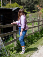 Cosy crew socks with a charming elegant cow design. These cow socks have two brown cows on and also black cow heads on a light cream background and a brown top, heel and toe. 
