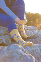 Stylish zebra socks featuring a striking zebra pattern against a mellow yellow background, complemented by a matte yellow top, heel, and toe. These unique socks blend fun and fashion, perfect for adding a pop of color and playful design to your wardrobe. Ideal for animal lovers and fashion enthusiasts alike, these socks offer both comfort and a cheerful vibe