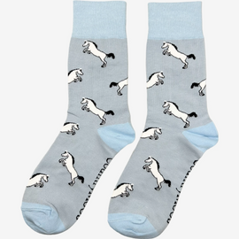 Elegant blue theme horse socks featuring stunning grey horses against a soft light blue background. These stylish socks are accentuated by a vibrant blue top, heel, and toe, creating a chic yet playful look for horse lovers and equestrian enthusiasts. Perfect for adding a touch of sophistication to your wardrobe, these comfortable socks are ideal for everyday wear or special occasions, celebrating a passion for horses and the beauty of the equestrian lifestyle