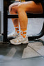Kmoo Orange Cow Print Sports Socks | Ribbed Crew