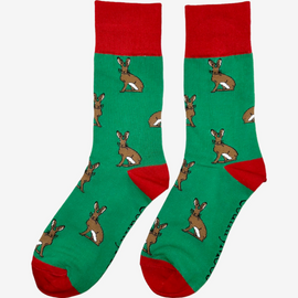 Charming country style hare socks set against a vibrant green background, adorned with playful hares and accented by bright red tops, heels, and toes. These eye-catching socks are perfect for nature lovers and those who appreciate whimsical countryside-themed fashion. A delightful addition to any sock collection, adding both comfort and a touch of personality.