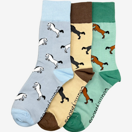 Mix pack of elegant horse socks featuring a sophisticated design in brown, blue, and green themes. This collection showcases intricate equestrian motifs and vibrant colors, perfect for horse lovers and enthusiasts. Crafted for comfort and style, these socks offer a perfect blend of functionality and fashion, making them an ideal choice for casual wear or equestrian events. A must-have accessory for anyone who appreciates the beauty of horses and the equestrian lifestyle.