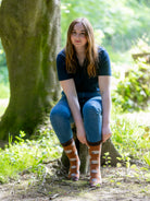 Unisex sheep socks. These cosy crew socks have cream sheep on a dark rich brown background with an even darker brown top, heel and toe. 