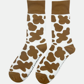 "Step up your style with our fabulous brown cow print socks, the perfect addition to your farm-themed wardrobe! Featuring a chic design inspired by the charm of the countryside, these cozy socks are both comfortable and trendy. Whether you're roaming the fields or relaxing at home, they add a playful touch to any outfit. Don’t miss out on bringing a bit of farm flair to your sock collection.