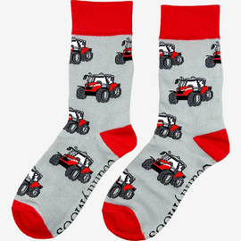 Adorable children's red tractor socks featuring playful red tractors against a stylish grey background, complete with matching red tops, heels, and toes. These fun and comfortable socks are perfect for young farm enthusiasts and add a touch of countryside charm to any outfit