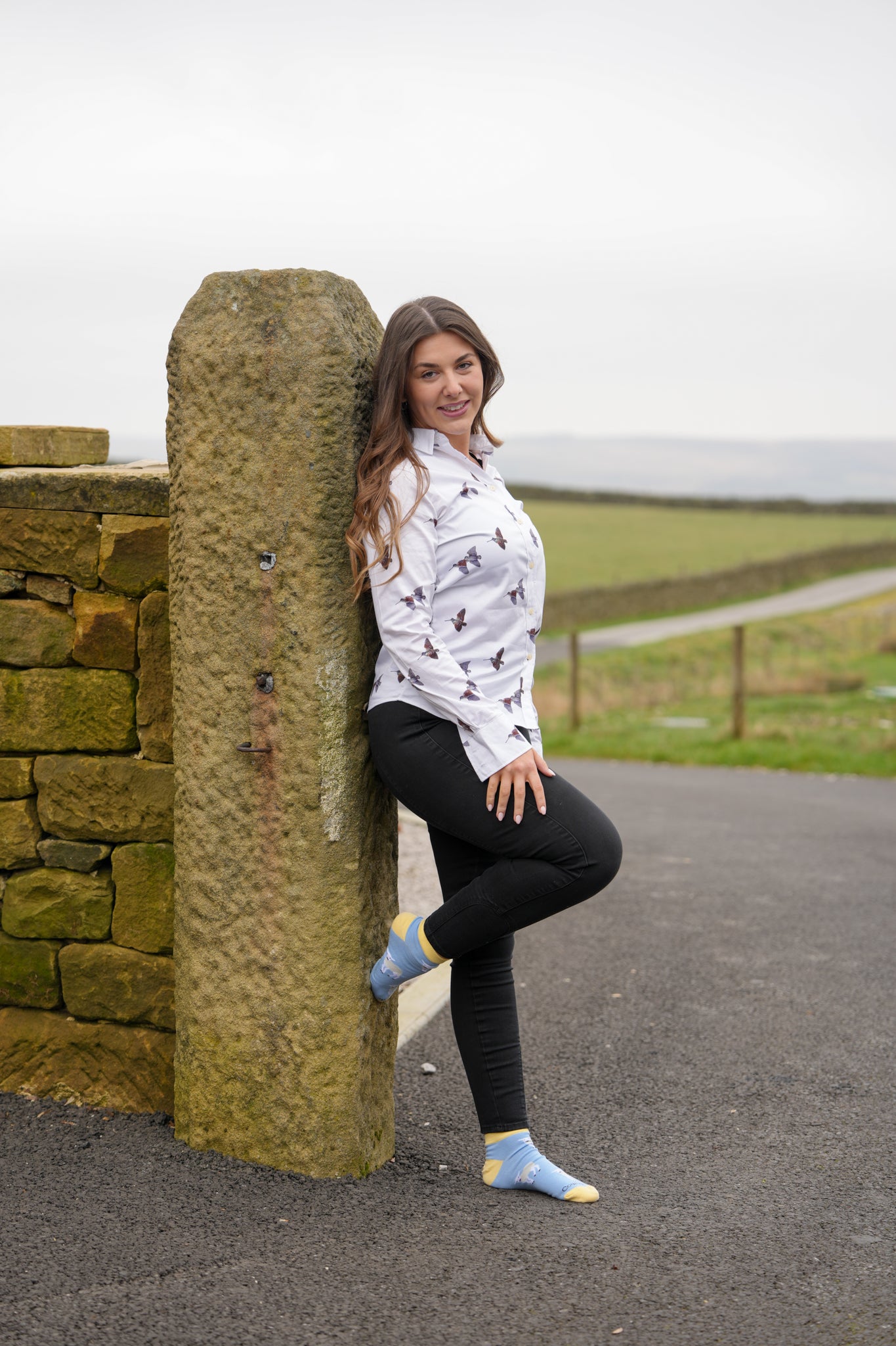 Country girl modelling lamb themed ankle socks 