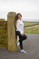 Country girl modelling lamb themed ankle socks 