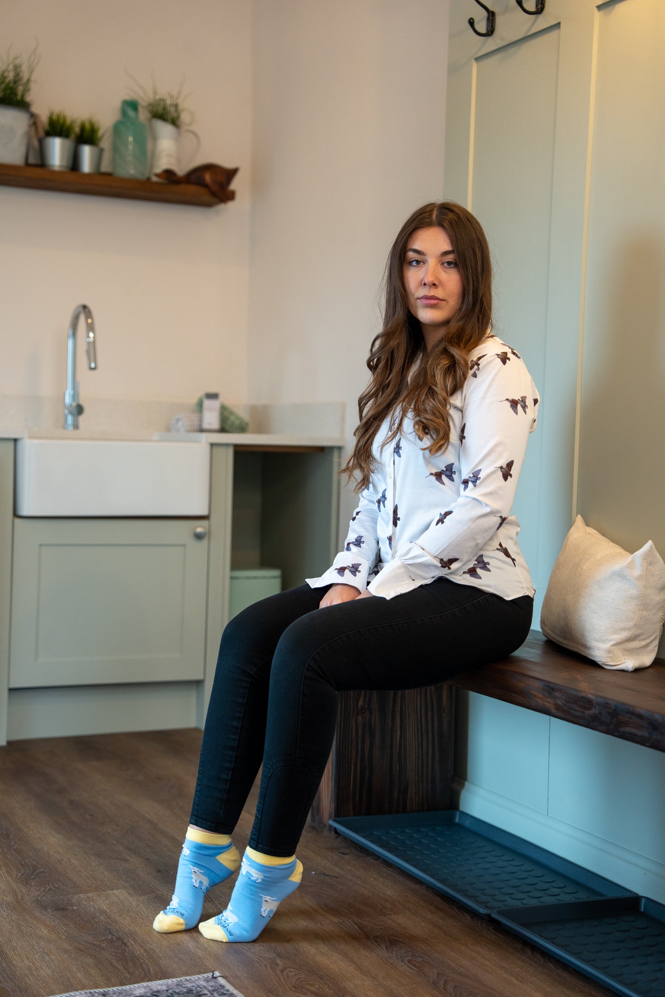 Country girl sat wearing lamb ankle socks