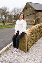 Country girl wearing pink tractor ankle socks 