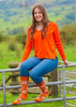 Discover our vibrant orange crew socks featuring playful Jack Russell terriers—perfect for countryside fashion and outdoor adventures! These stylish socks add a pop of color while offering comfort and durability for your hikes or casual outings. Show off your love for Jack Russells as you embrace nature with every step. Elevate your outdoor wardrobe with these must-have socks today!