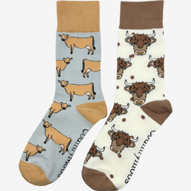 2 pairs of crew socks featuring a jersey cow design on a light grey background, showcasing elegant brown cows with an elegantly matched brown top, heel, and toe. Also included are Highland cow socks, set against a cream backdrop adorned with playful brown highland cows and brown polka dots, complemented by matching brown tops, heels, and toes. Perfect gifts for countryside enthusiasts, outdoor lovers and farming people, these cozy socks bring a touch of country style and comfort.