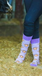 Step out in style with our purple and white striped cow socks featuring adorable black and white cows. Perfect for outdoor adventures or cozy days at home, these comfy socks add a playful touch to any outfit, making them ideal for cow lovers and those looking to elevate their wardrobe.