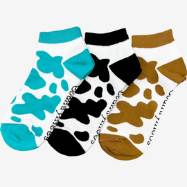 Charming mix pack of 3 cow print ankle socks available in vibrant colors including pink, brown, blue, black, and green. Each pair features a playful cow print design perfect for country fashion enthusiasts, animal lovers, and farming aficionados. These comfortable socks are ideal for those who appreciate outdoor adventures and the beauty of the countryside, adding a stylish and fun touch to any casual outfit