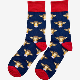 Cow socks featuring a vibrant red top, heel, and toe against a stylish navy blue background. These eye-catching brown cow socks blend playful cow motifs with a bold colour scheme, ideal for animal lovers and fashion enthusiasts alike. Perfect for adding a fun and unique touch to your country style sock collection while ensuring comfort for everyday outdoor wear.