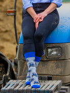 Discover our blue-themed tractor socks, the perfect accessory for cozy days at home or adventurous walks in the countryside. Crafted from soft, comfortable fabric, these stylish socks feature an eye-catching tractor design, adding a touch of rural charm to your wardrobe. Ideal for farming enthusiasts and lovers of country life