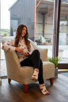 country girl modelling highland cow ankle socks 