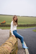 country girl wearing blue themed lamb sheep socks