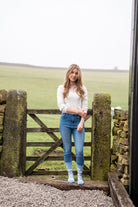 country girl wearing blue themed romney sheep socks 
