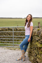 country girl wearing cow welly socks