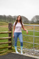 country model wearing mix cow print crew socks 