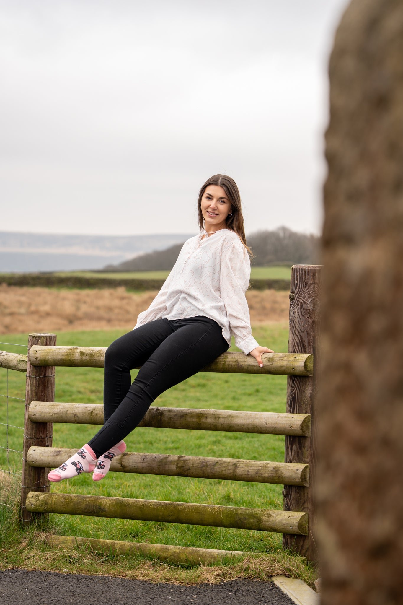 girl modelling pink tractor ankle socks 