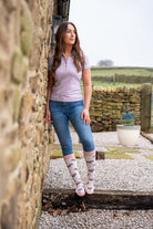 model wearing pink 4x4 welly socks 