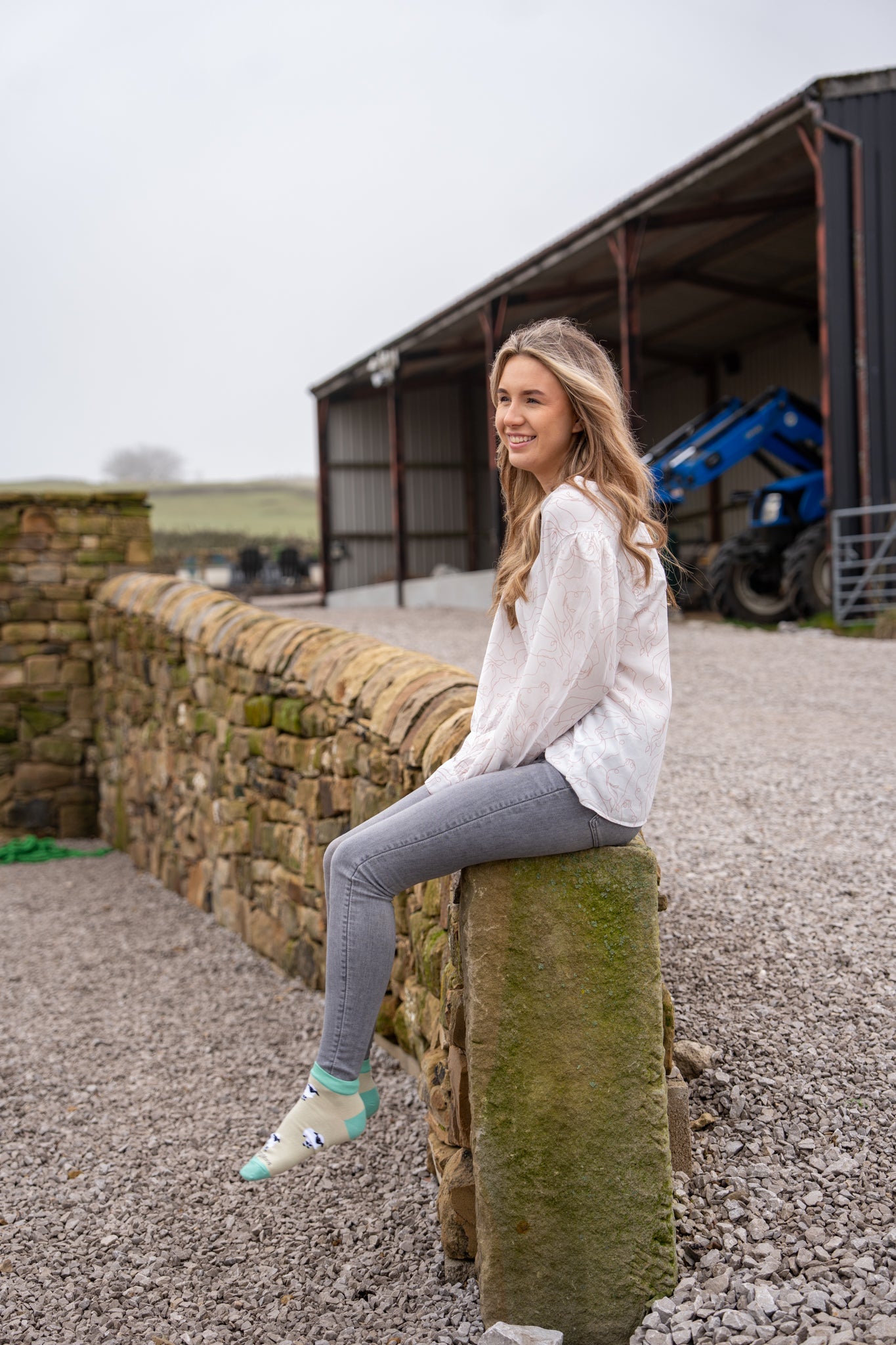 model wearing valais blacknose sheep ankle socks 
